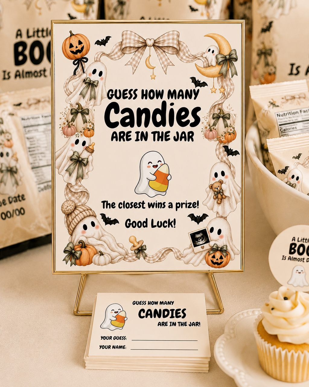 Halloween baby shower candy guessing game featuring A Little Boo Is Almost Due ghost and pumpkin decorations