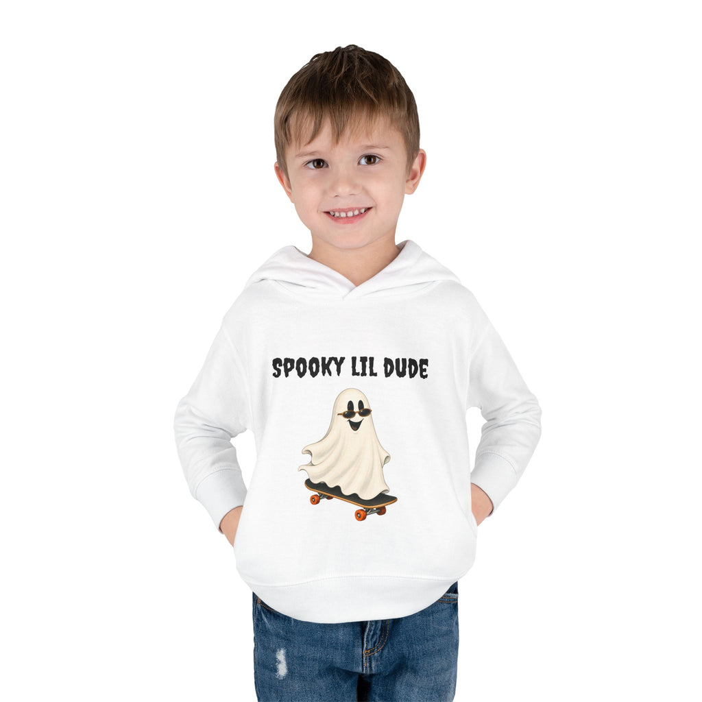 Child wearing a white Spooky Lil Dude Halloween hoodie featuring a cute ghost riding a skateboard