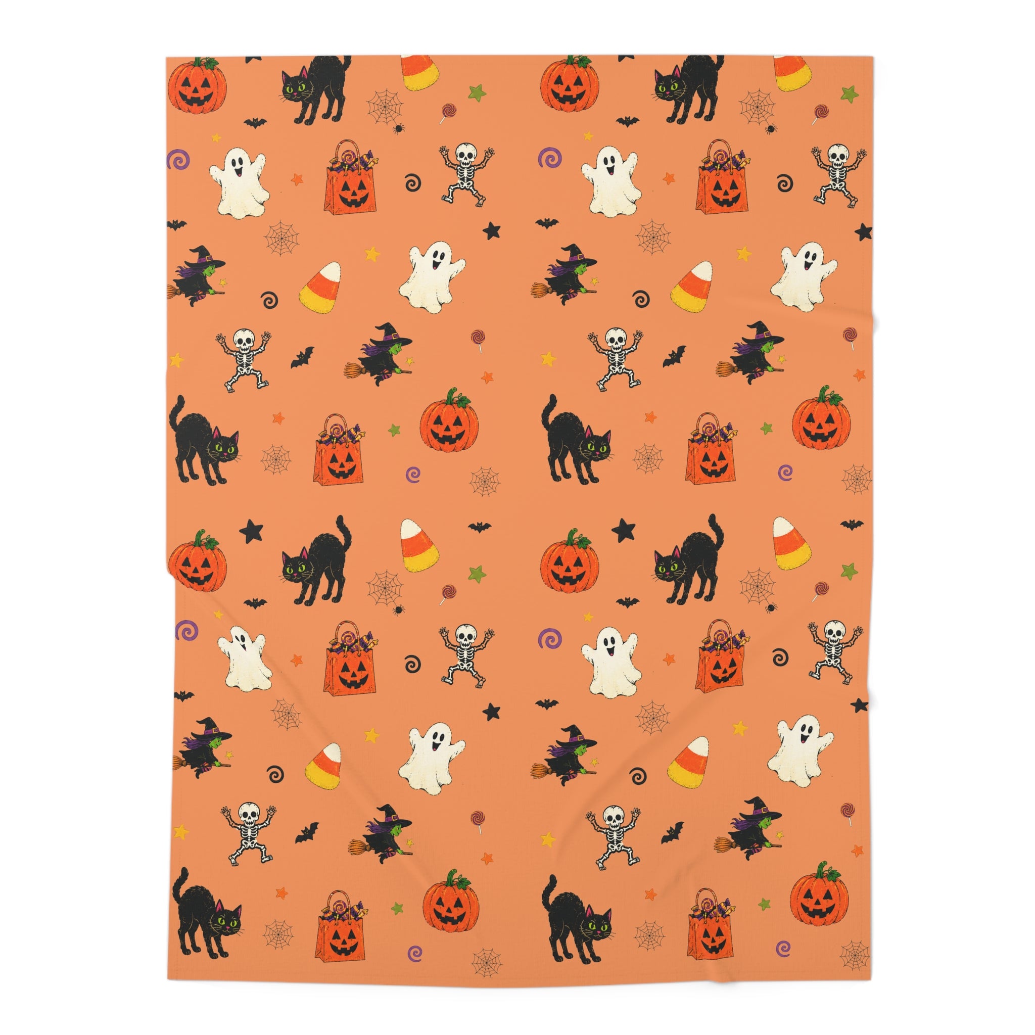 Classic Halloween blanket featuring pumpkins, ghosts, black cats, witches and skeletons on an orange background