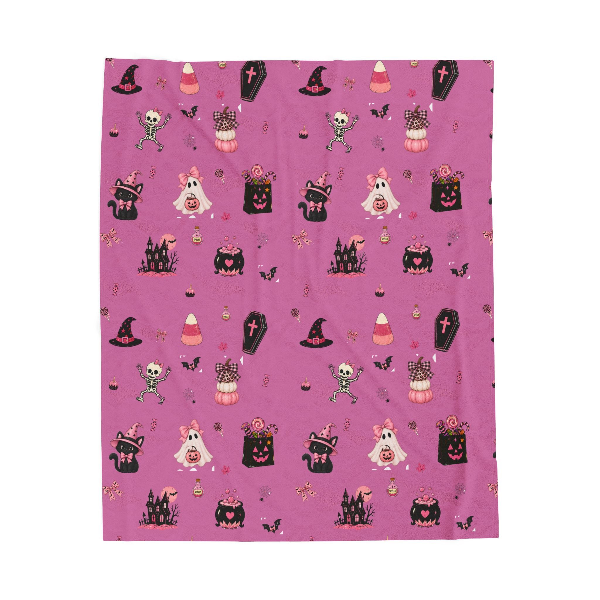 Cute girly Halloween blanket in pink with ghosts, witches, bats, pumpkins, candy and spooky Halloween designs