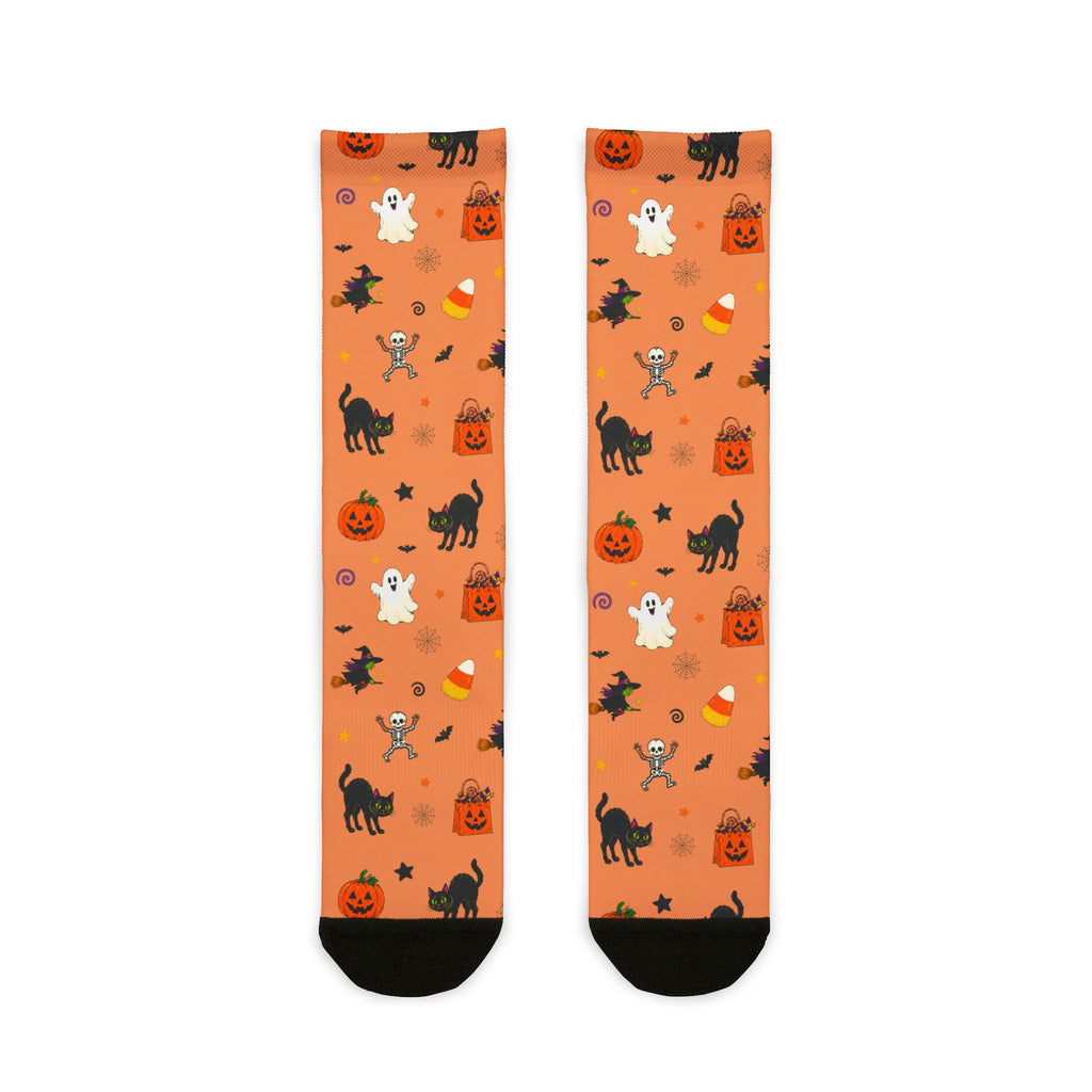 Cute spooky socks featuring a Halloween pattern of pumpkins, witches, ghosts and bats