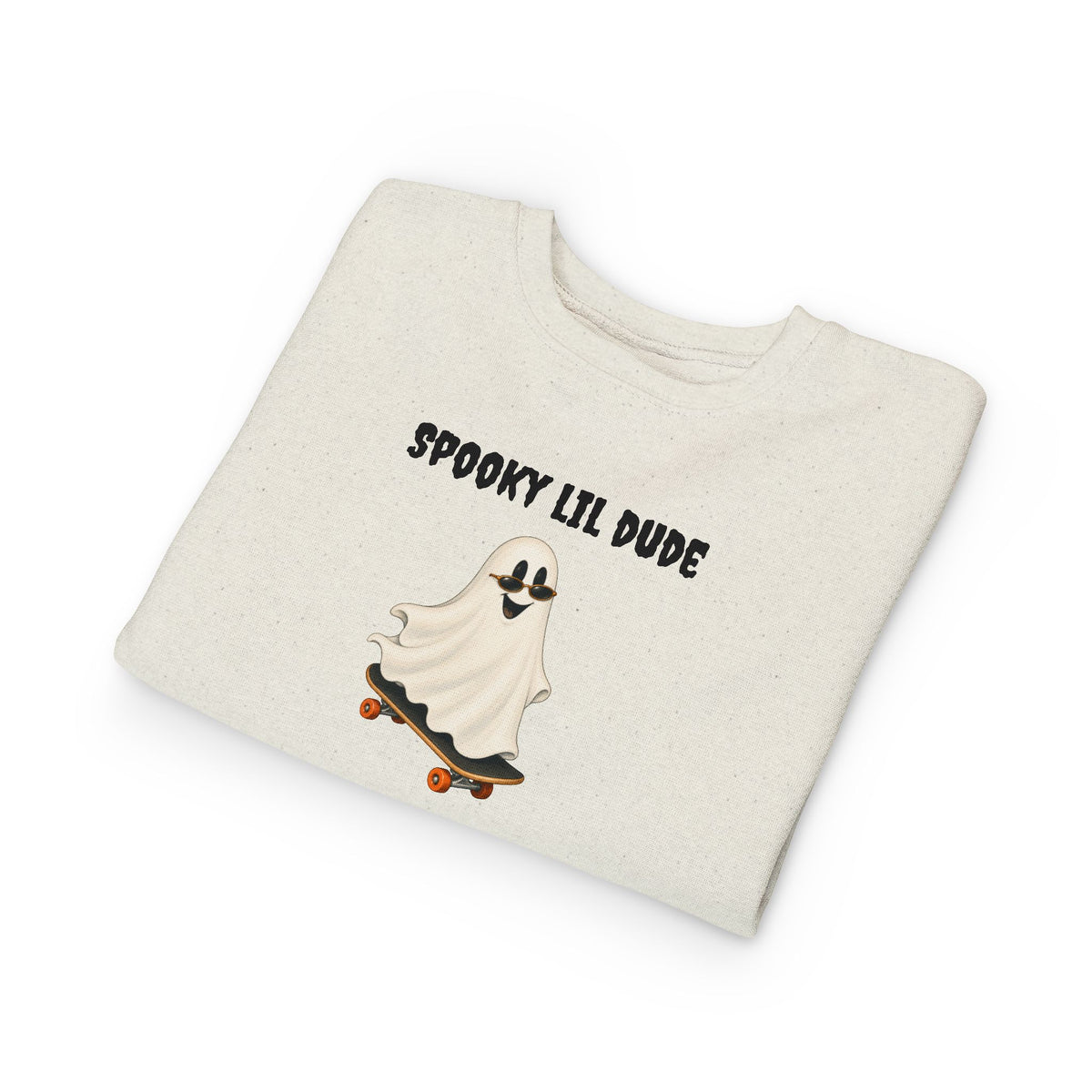 Folded beige Spooky Lil Dude Halloween sweater featuring a cute ghost skateboard design and “Spooky Lil Dude” lettering.