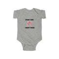 Gray baby Halloween onesie featuring “Spooky Vibes, Chunky Thighs” and a pink bow.