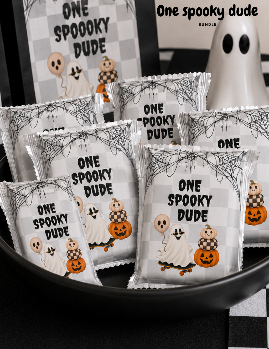 Halloween first birthday party printables including coordinated treat wrappers and party decorations