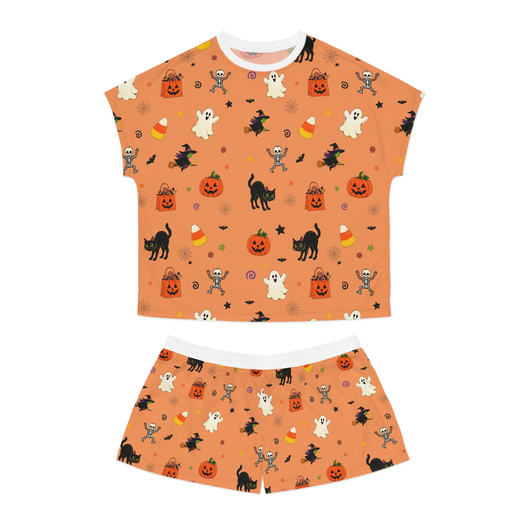 Orange Halloween pajama set for women with pumpkins, ghosts, bats and candy corn