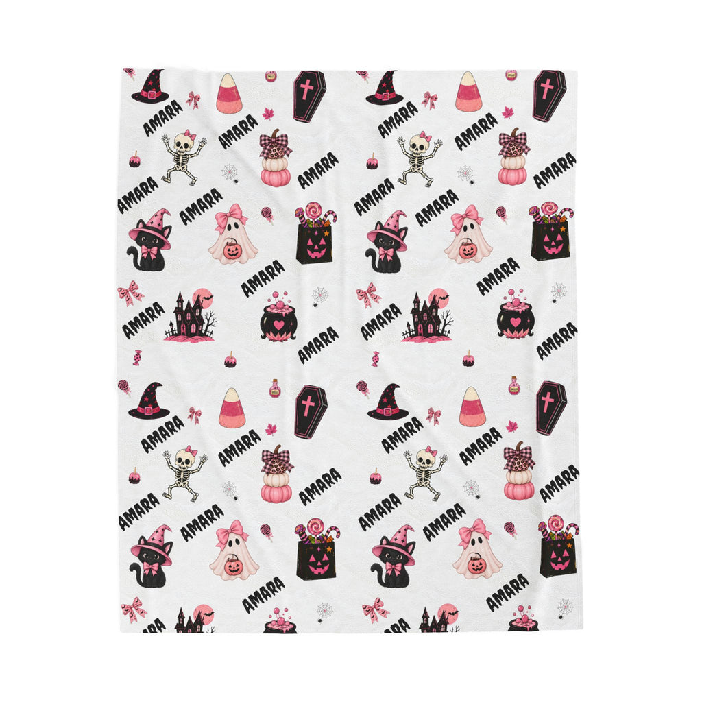 Personalized Halloween throw blanket with custom name and cute pink and black spooky Halloween pattern
