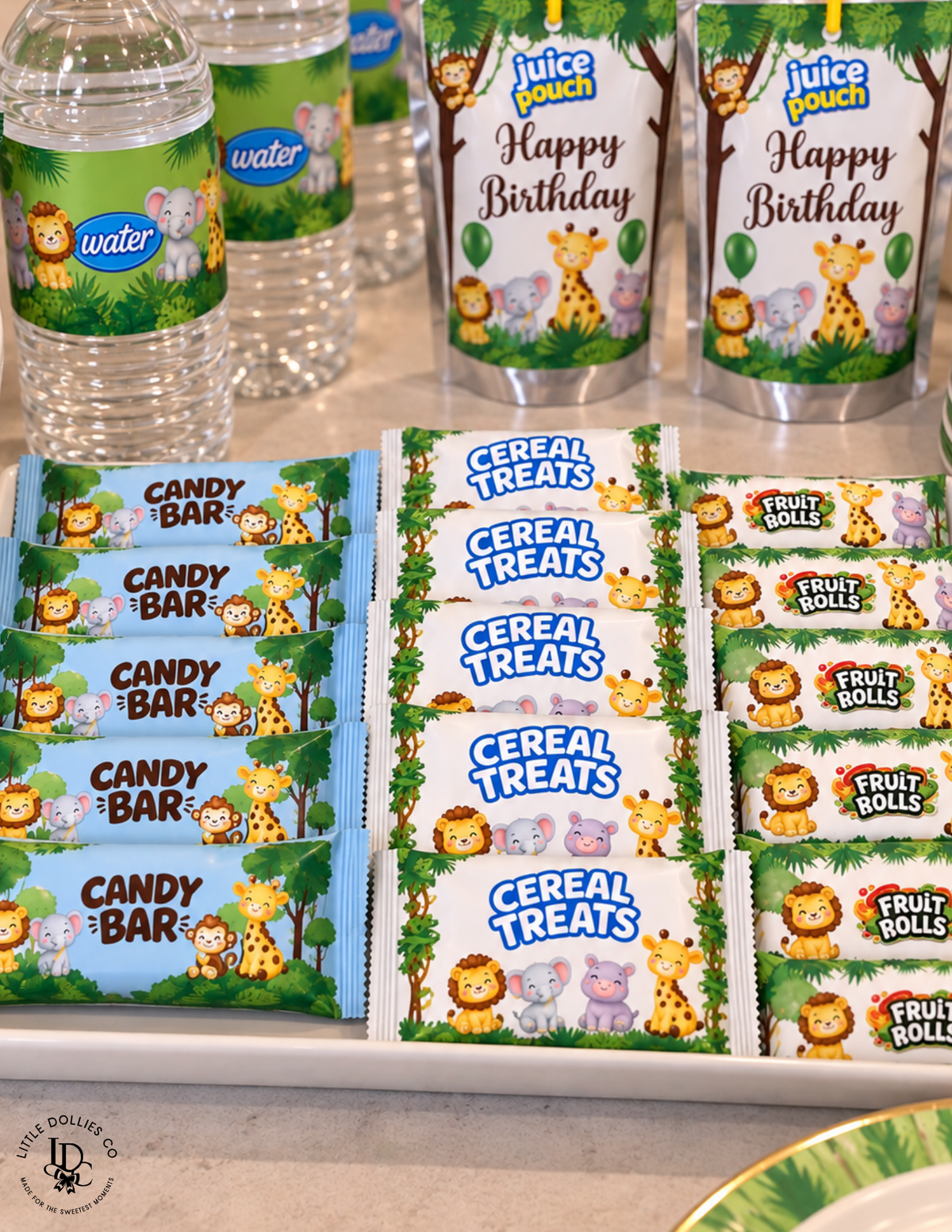 Wild One first birthday party bundle featuring editable invitation, gift bag, chip bag, candy bar, Rice Krispies, water bottle, and juice pouch templates
