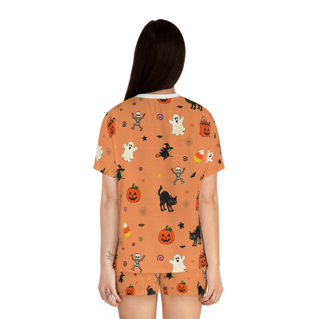 Women’s Halloween pajamas with orange Halloween shirt and matching shorts